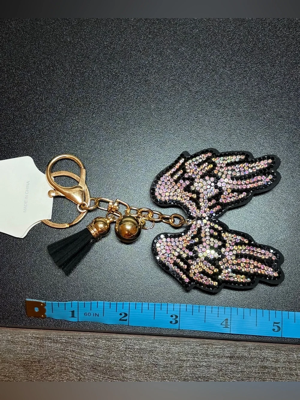 Gold-Tone Iridescent Crystal Angel Wing Keychain with Black Tassel